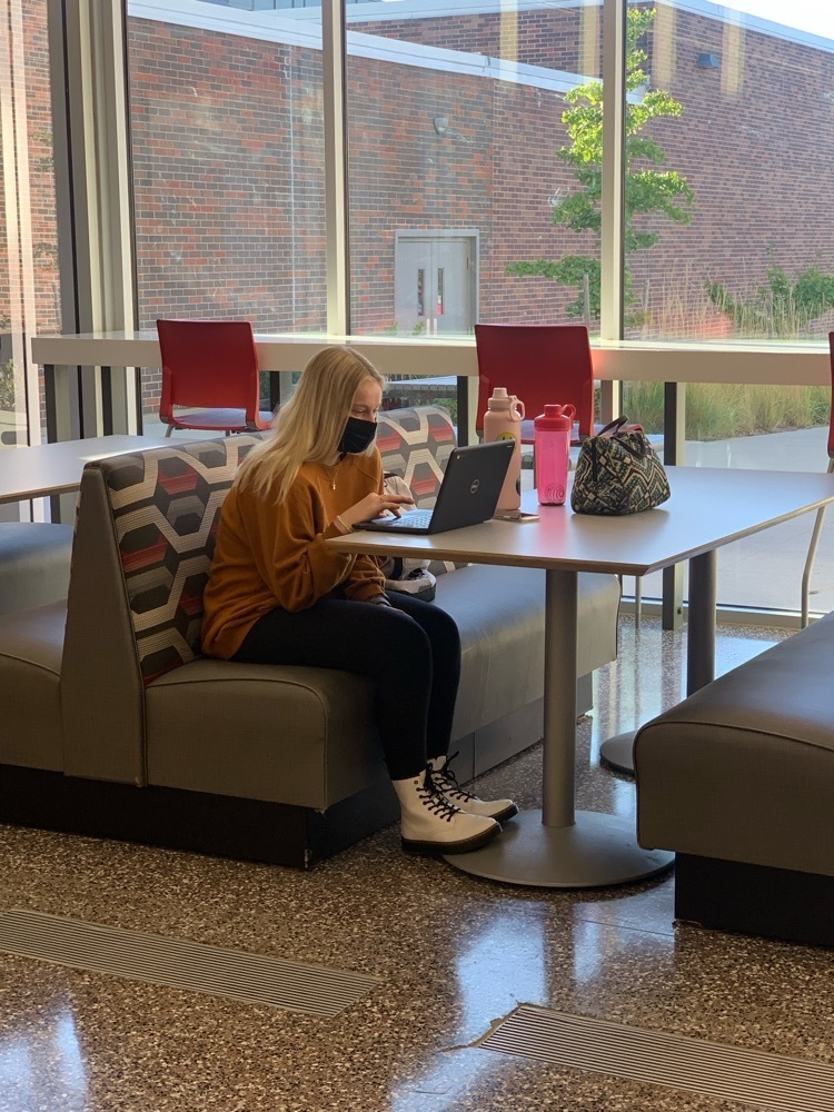 student working on a clas