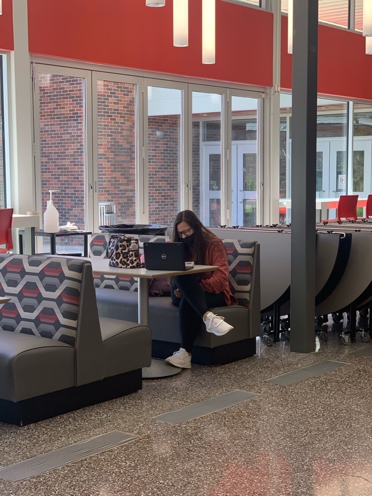 student working on a class