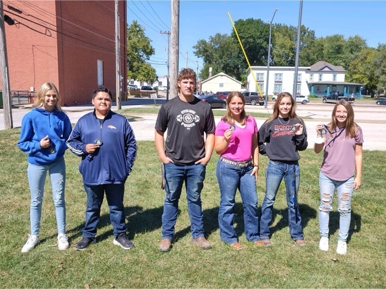 students standing and posing for a picture 