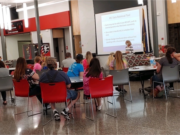 people listening to a presentation 