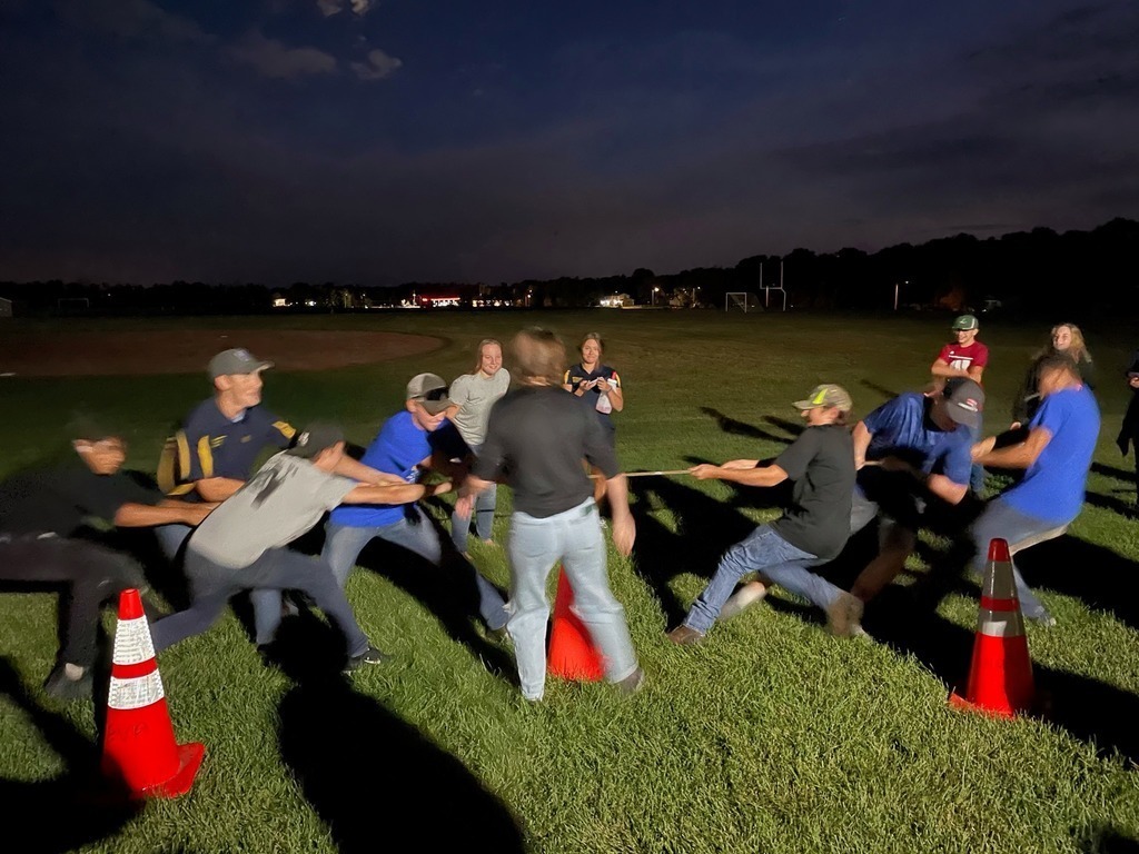 students playing tug of war