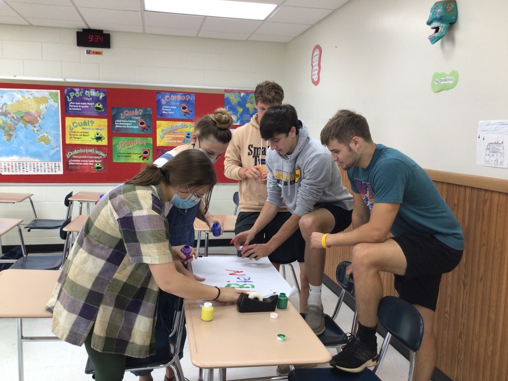 Students making fingerprint art