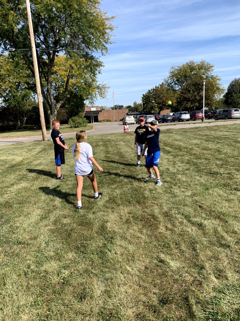 Students playing Mayan ball game