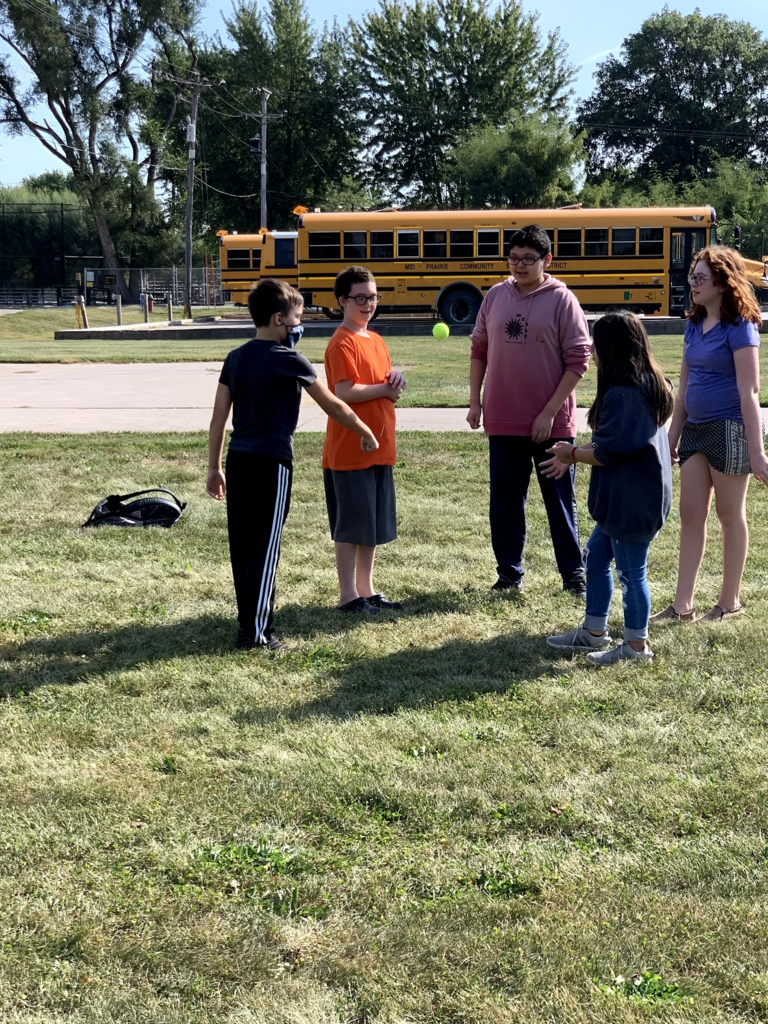 Students playing Mayan ball game