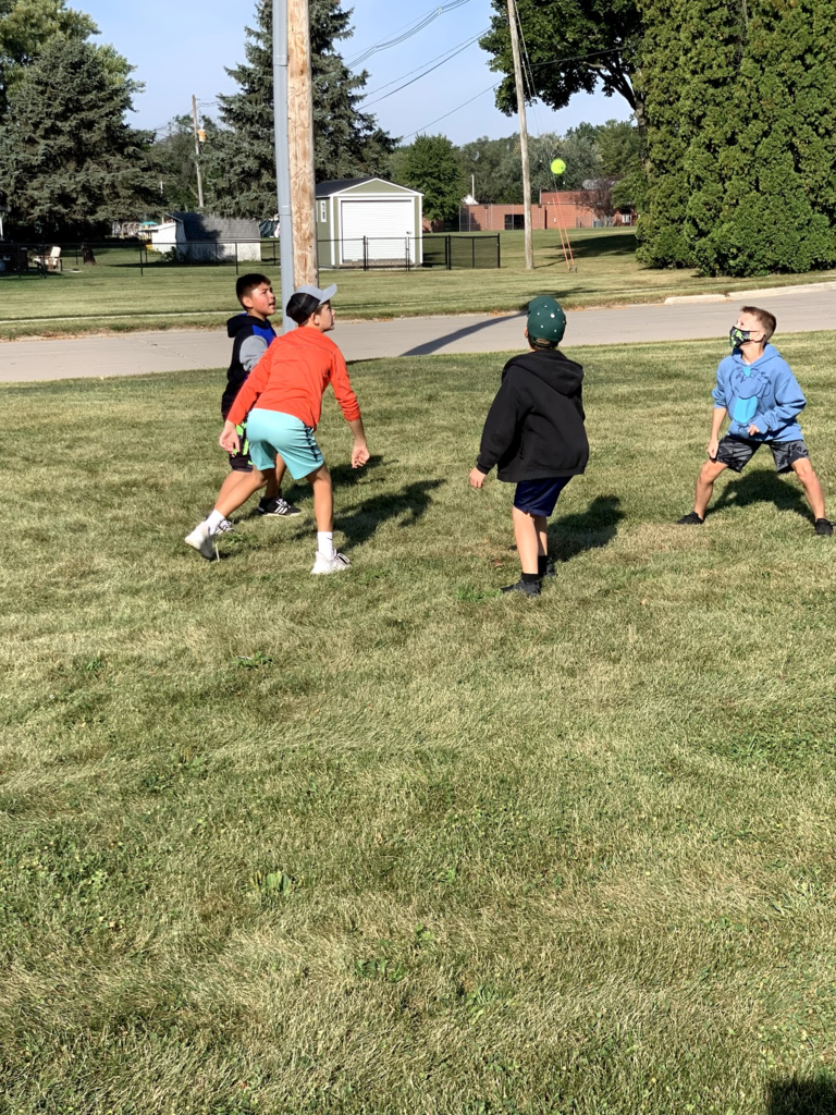 Students playing Mayan ball game