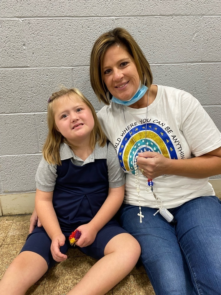 Mrs. Boyles and Kacey leading the Rosary.