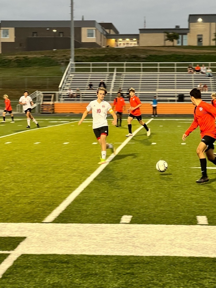 boys playing soccer 