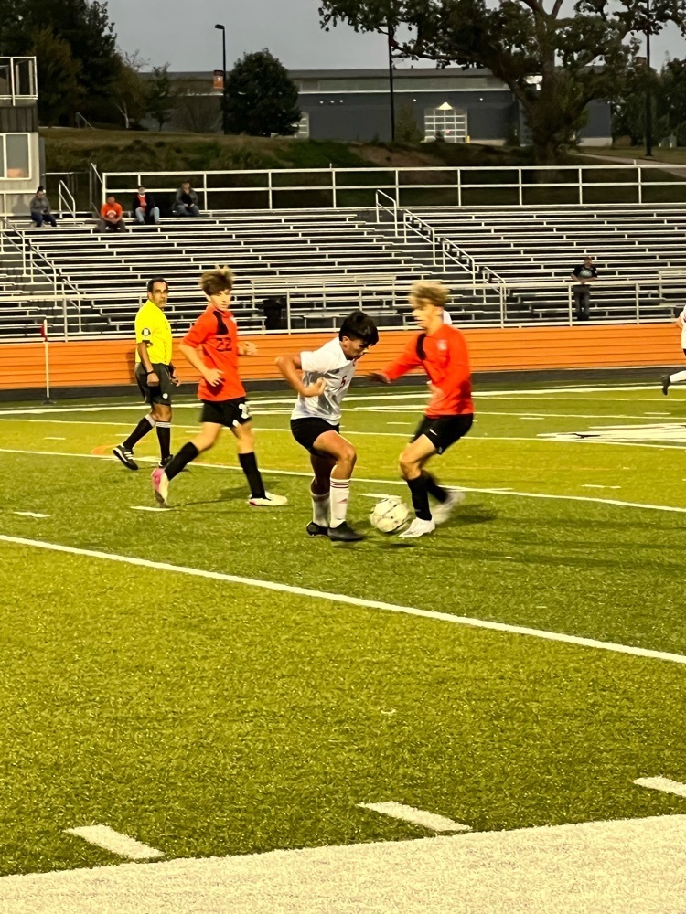 boys playing soccer 