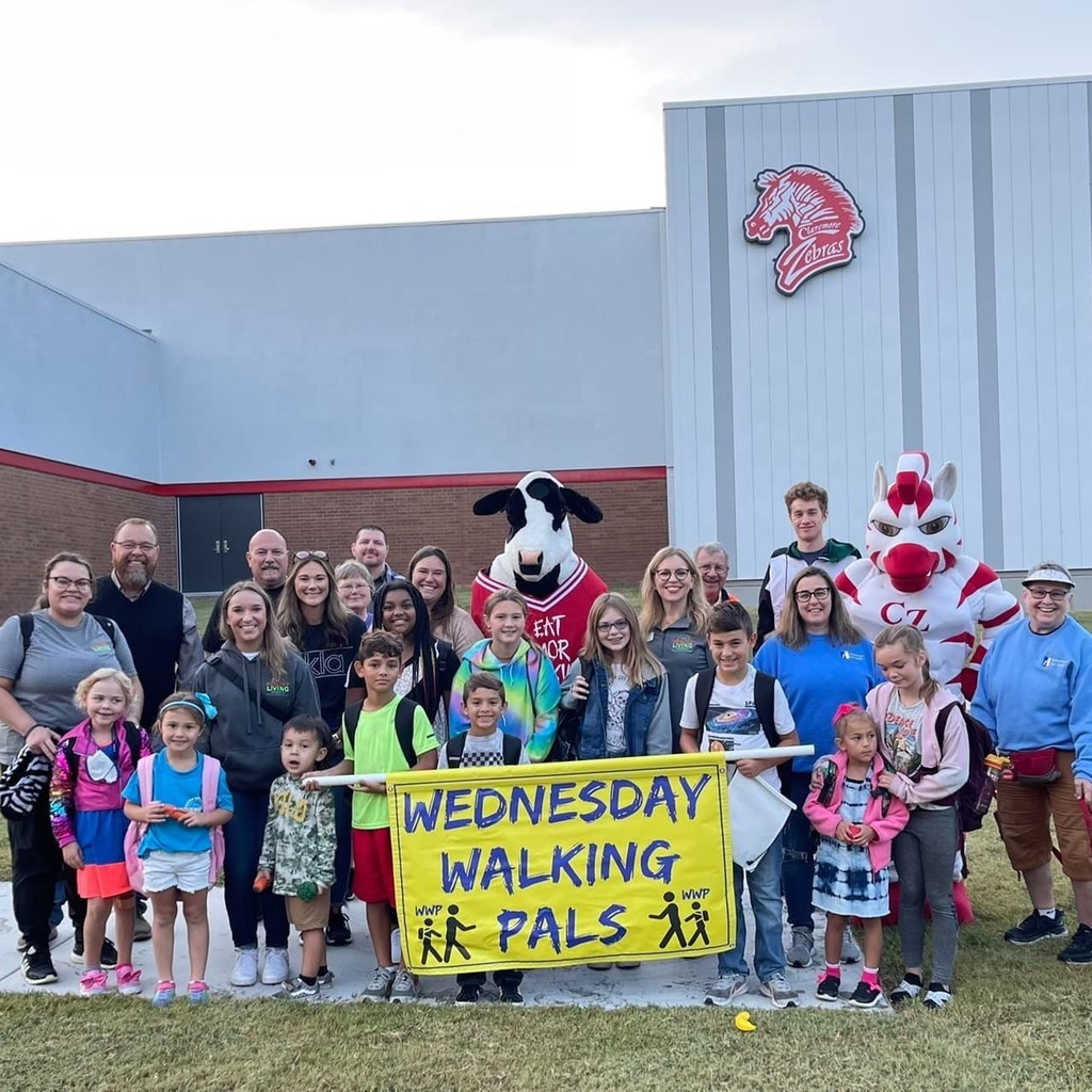 Group of students, parents, & mascots. 