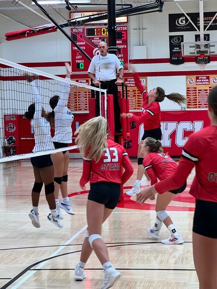 girl spiking a volleyball 