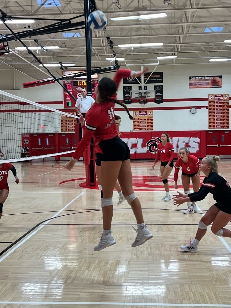 girls playing volleyball 