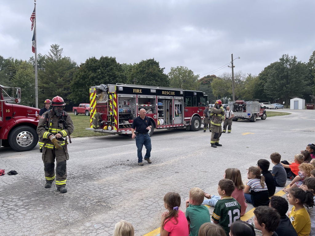 Firefighters teaching students