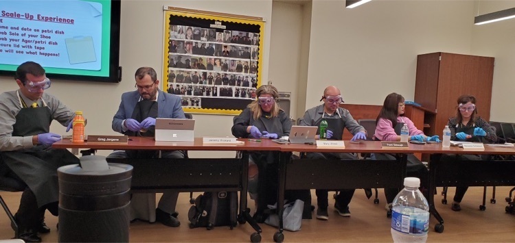 board members completing a STEAM activity