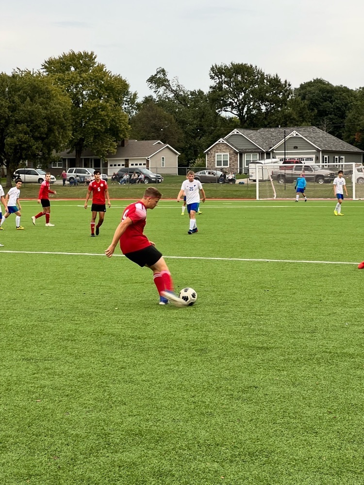 boys playing soccer 