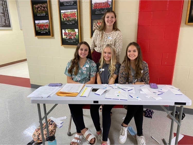 students at a table 