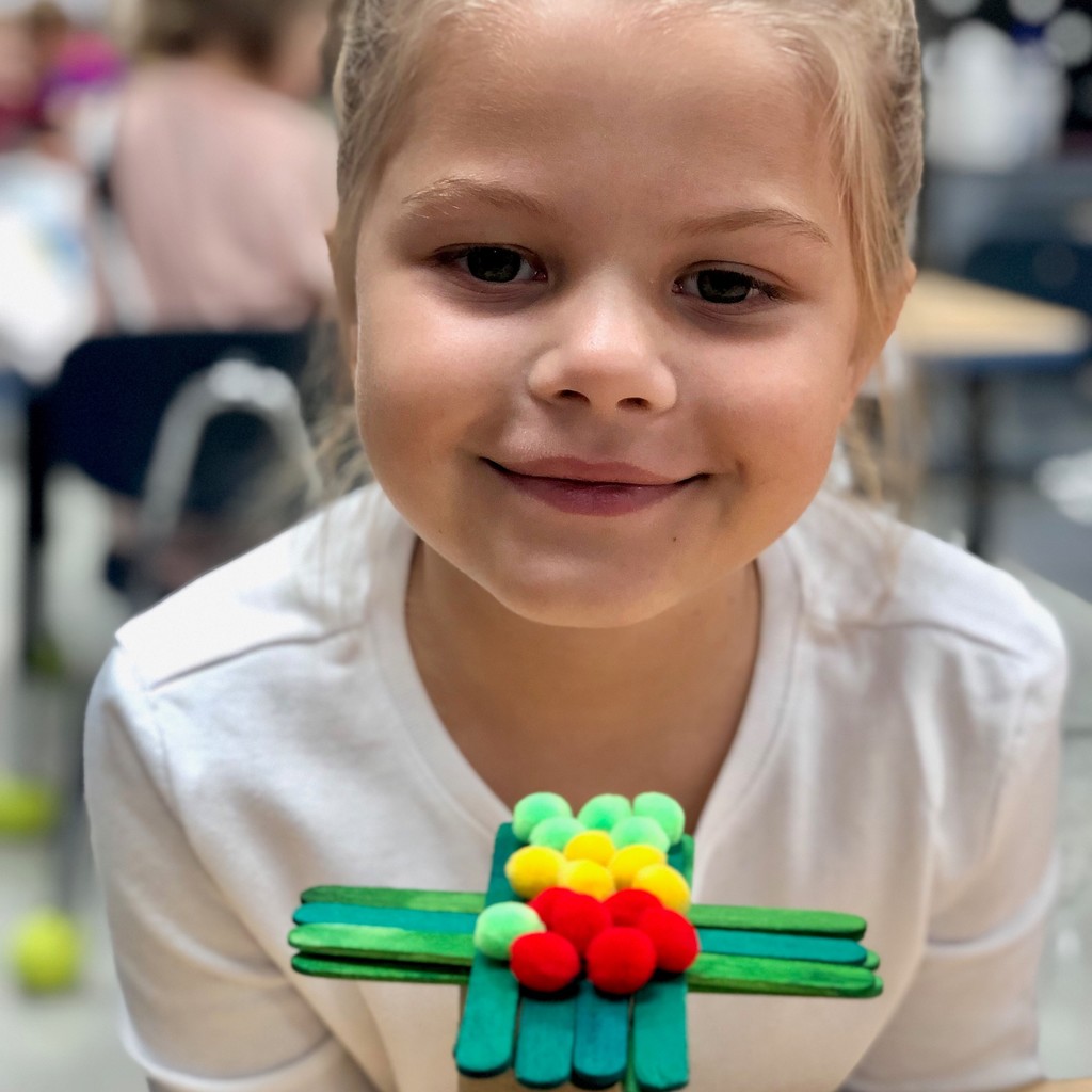 girl with apple tree smiling