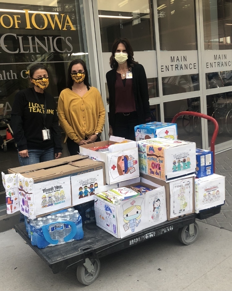 Staff members dropping off donations