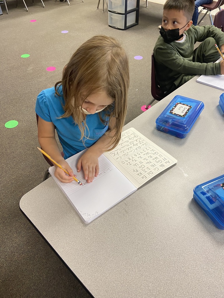 students writing a story