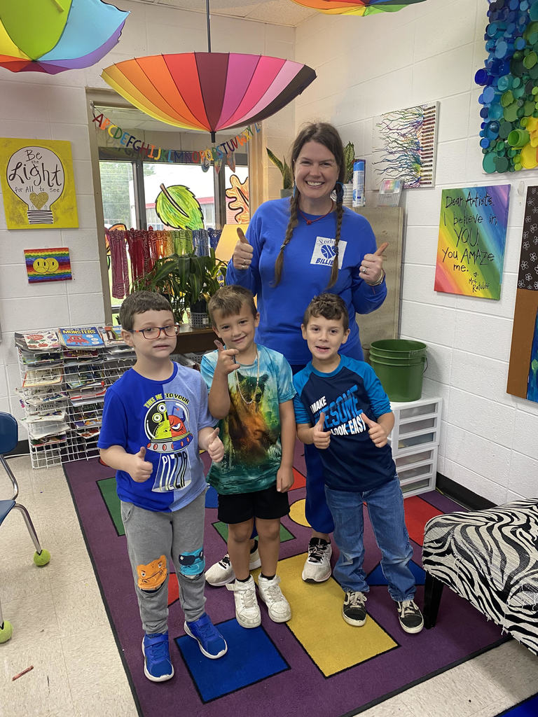 3 boys with teacher in pjs