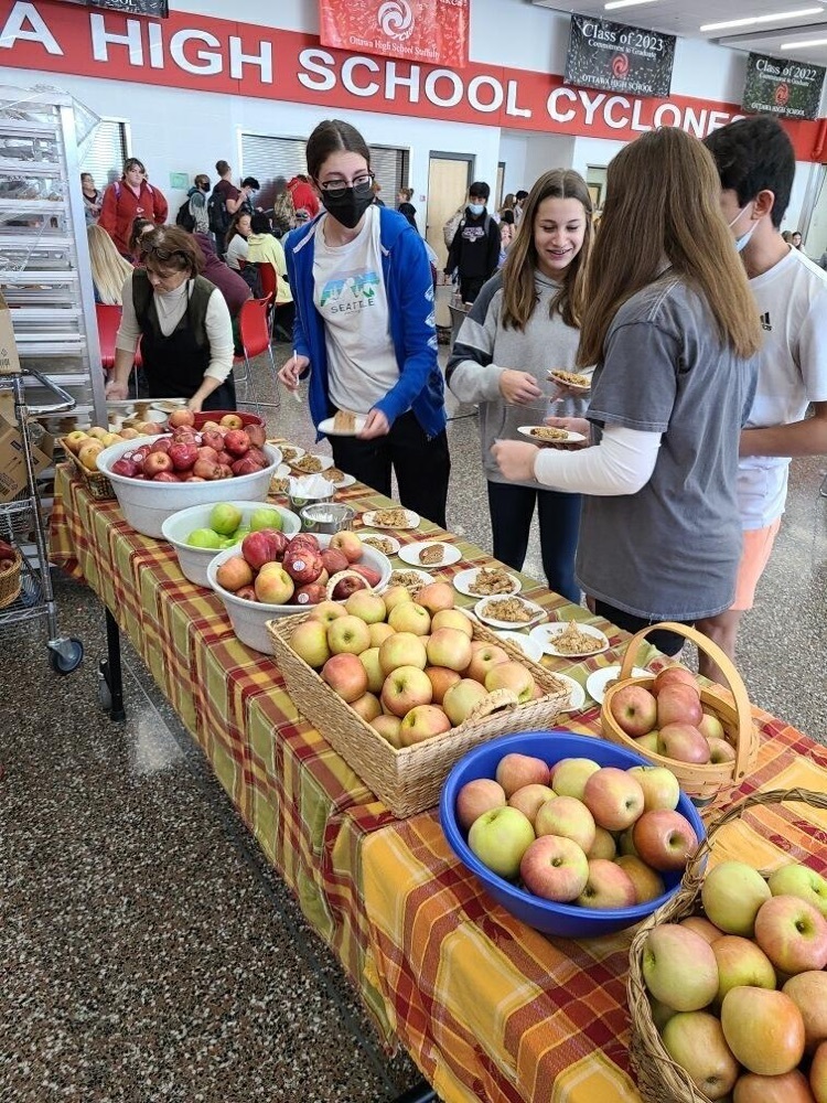 students with apples 