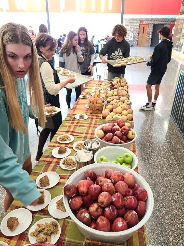 students getting apples 