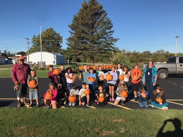 Students with pumpkins