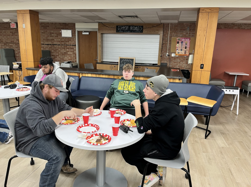 Students eating BBQ