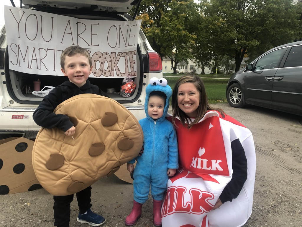 Staff dressed as Cookie Monster, cookie and milk