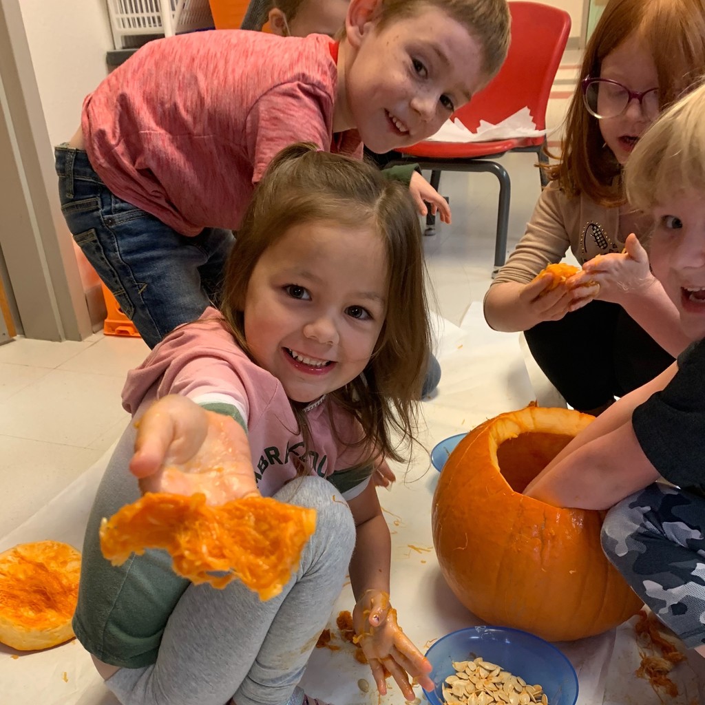 girl showing us what she pulled out of the pumpkin