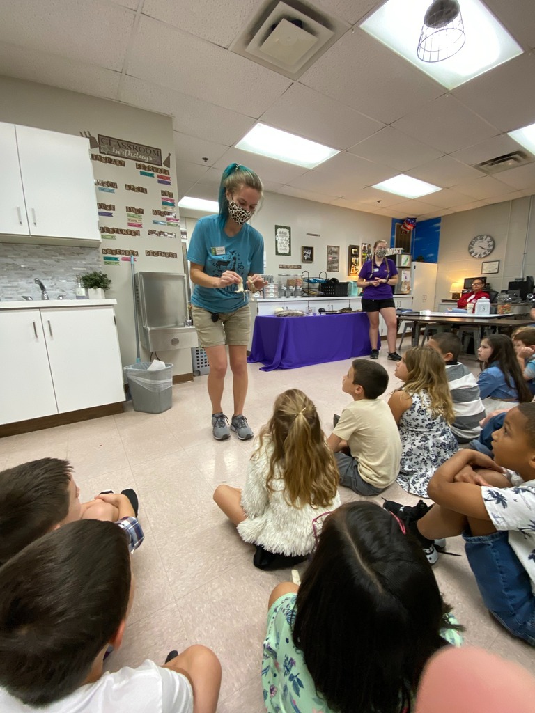 teacher with reptile
