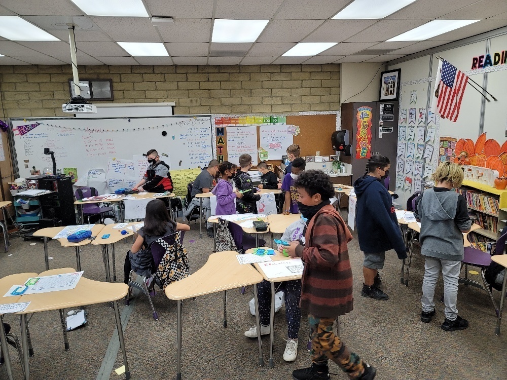 Image of more students browsing the Market Day items