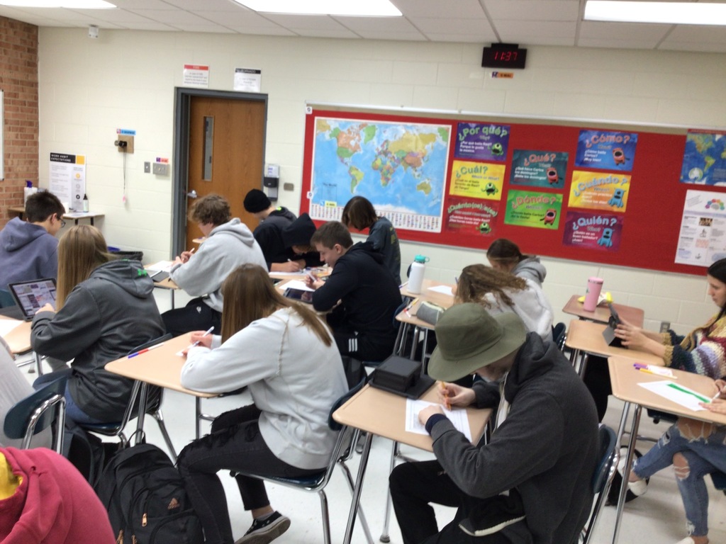 Students making Veteran's Day decorations