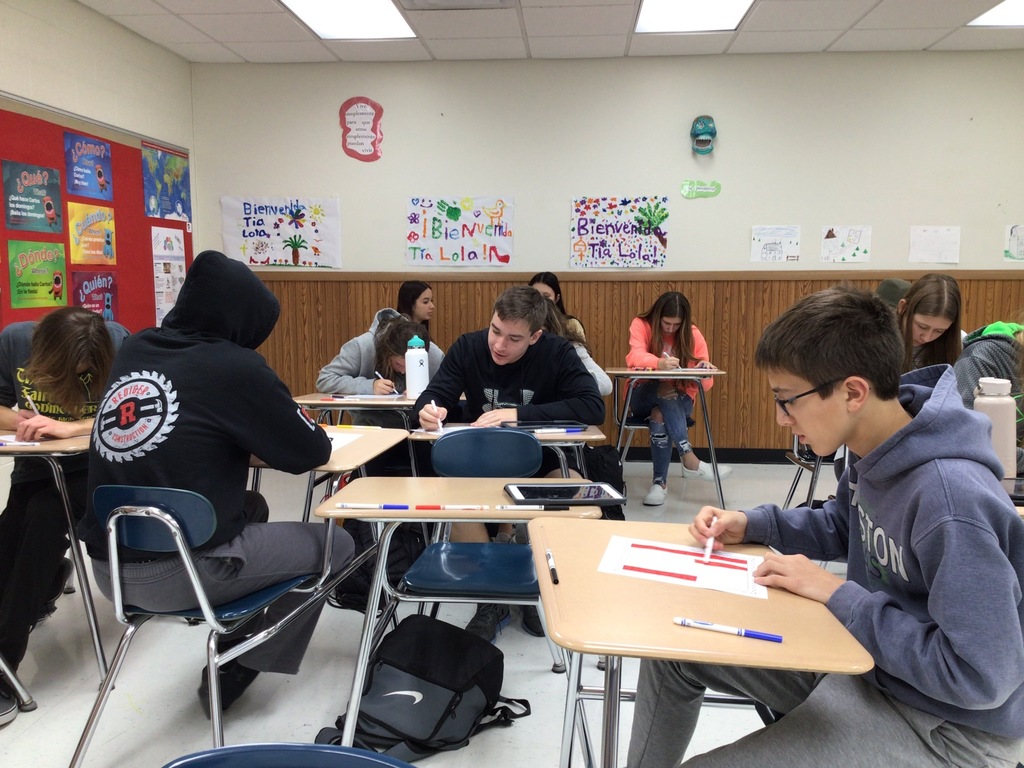 Students making Veteran's Day decorations