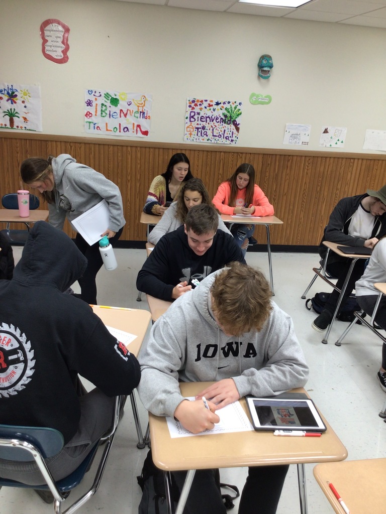 Students making Veteran's Day decorations