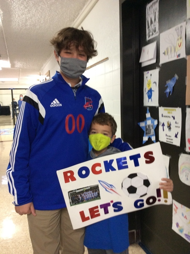 State-bound boys soccer visits elementary students.