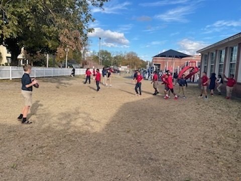 students playing football 