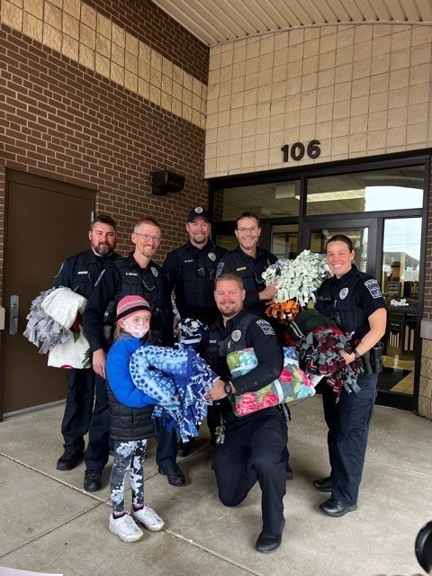 Students thanking police officers