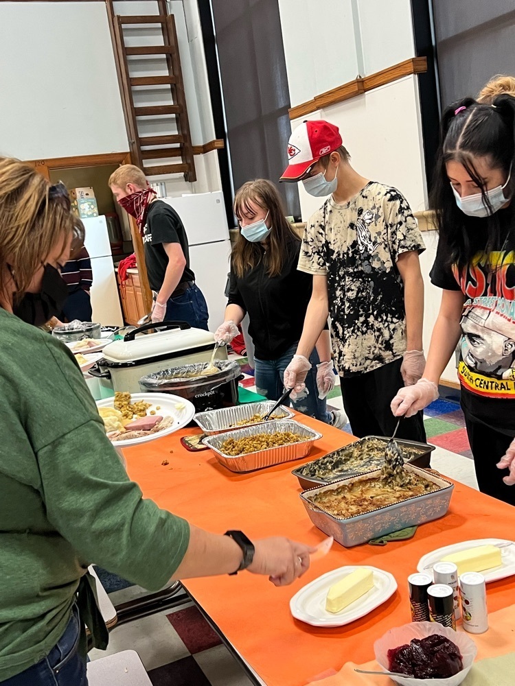 students serving a meal 