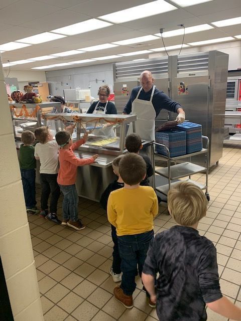 Mr. Weatherwax Serving Lunch