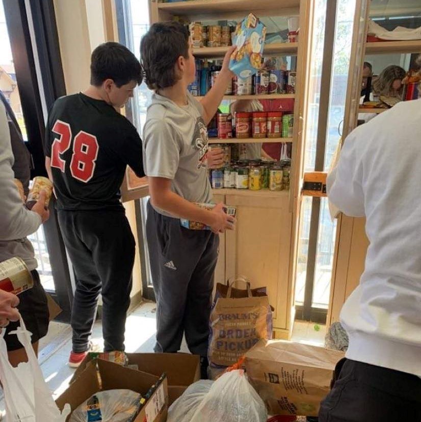 Baseball team loading shelves