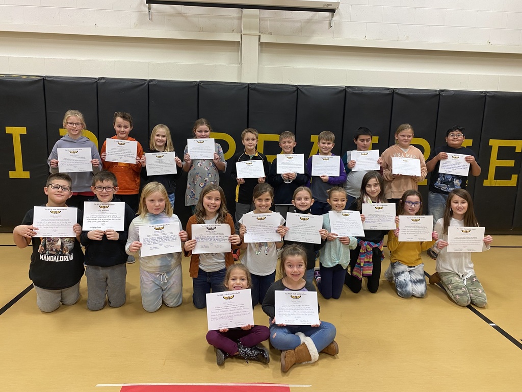 Student group photo with certificates