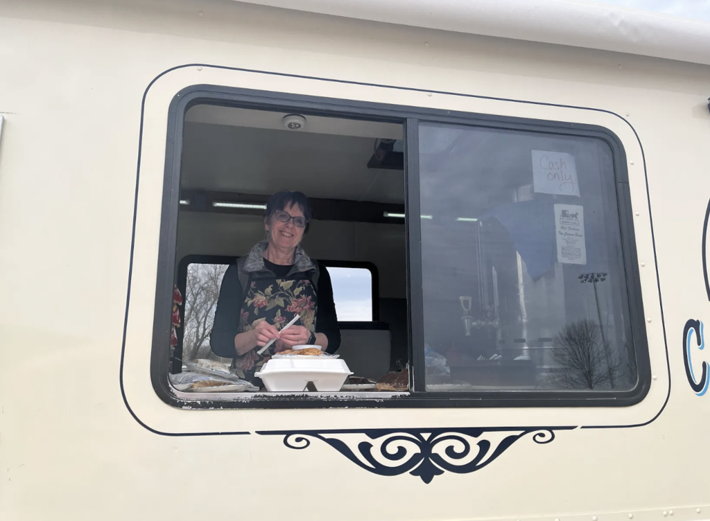Janet Stutzman serving lunch