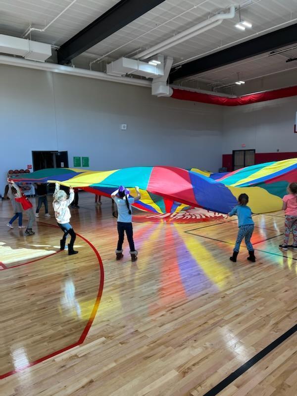 Do you remember playing with parachutes as a kid? The BEST gym day was when the teacher brought out the parachute! Check out our Kindergarten students enjoying parachute day! #CPSZEBRAPRIDE