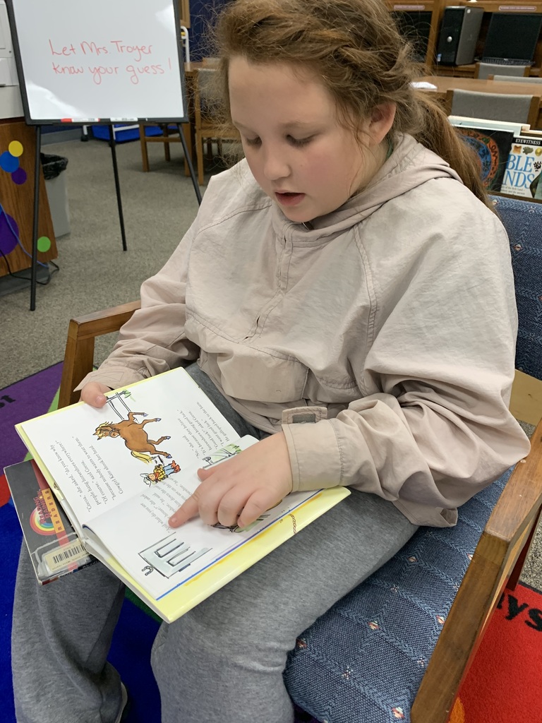 2nd Graders Drop Everything And Read During their library visit. Because, sometimes, you just need to read! #CPSZEBRAPRIDE
