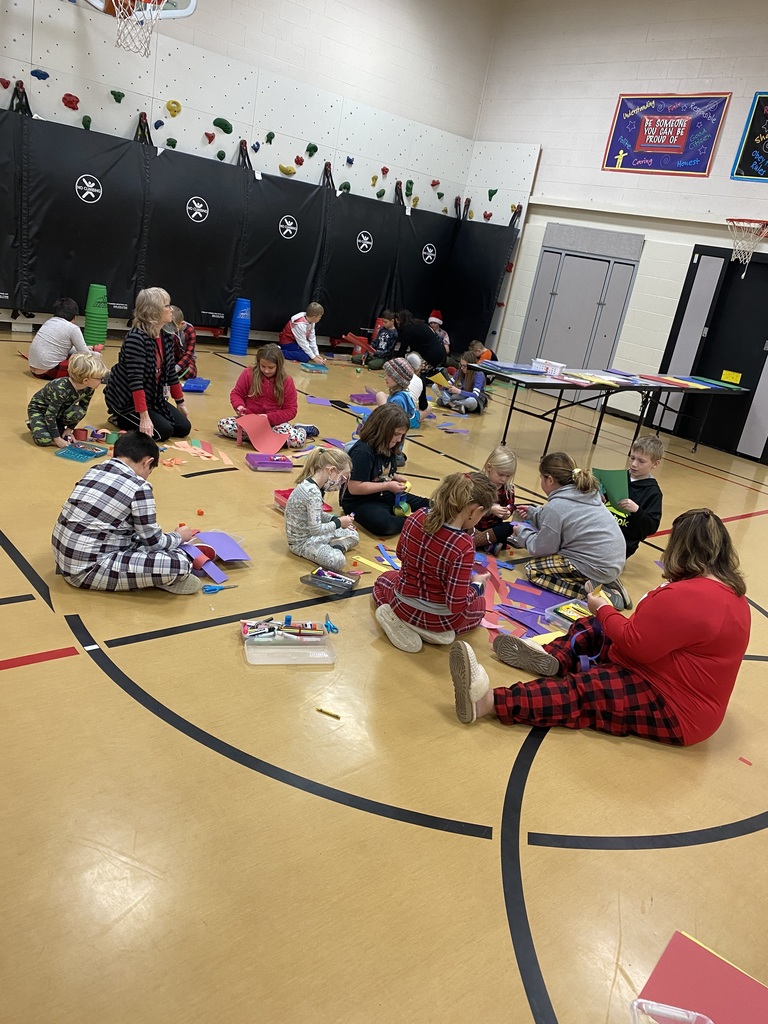 Students working together to make paper chains