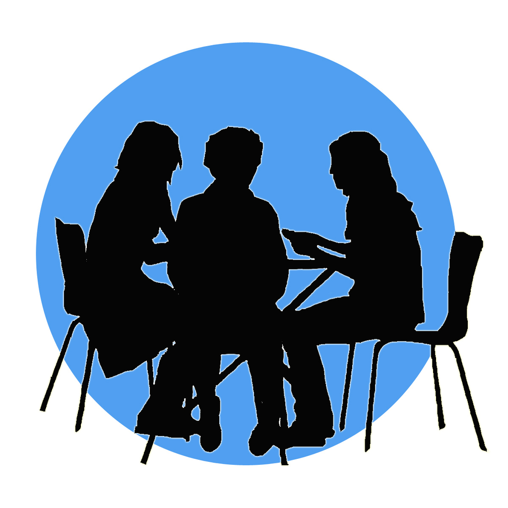 3 people around a table