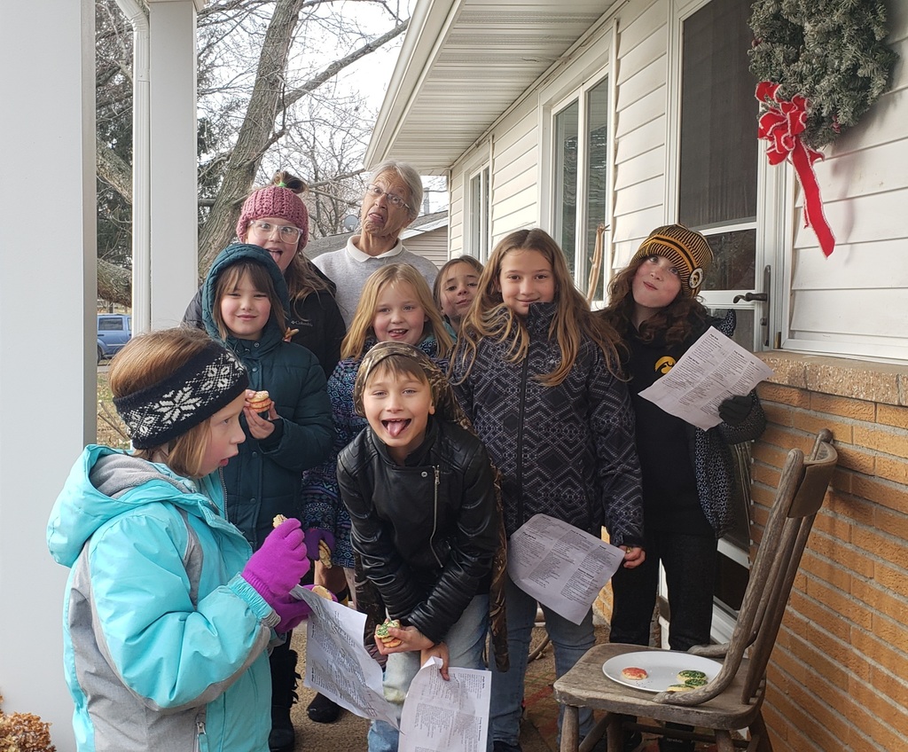 Students caroling with residents