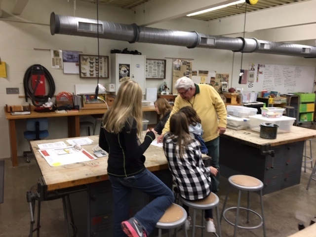 Mr. Foster points out details during an agriculture class.