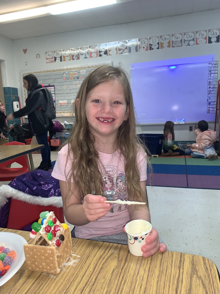 Belpre Elementary Kindergarten students and their families worked together to build gingerbread houses too cute to eat. 