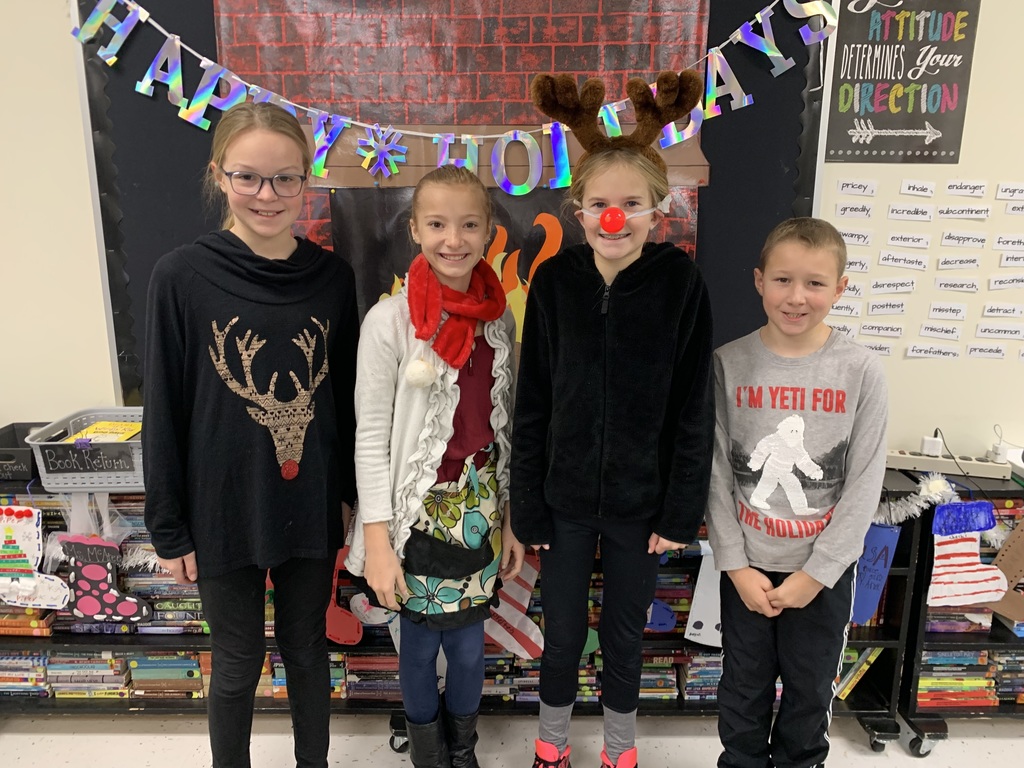5th graders dressed in Christmas attire
